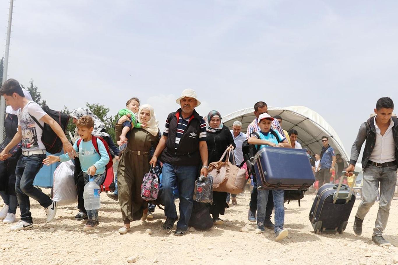 Suriyeliler bayram için sınır kapılarına akın ediyor